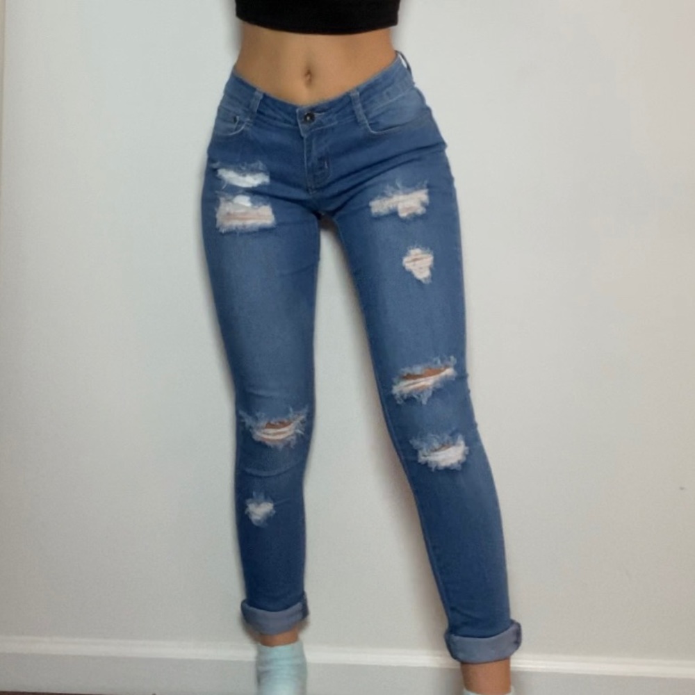 Mid Rise Distressed Skinny Jean